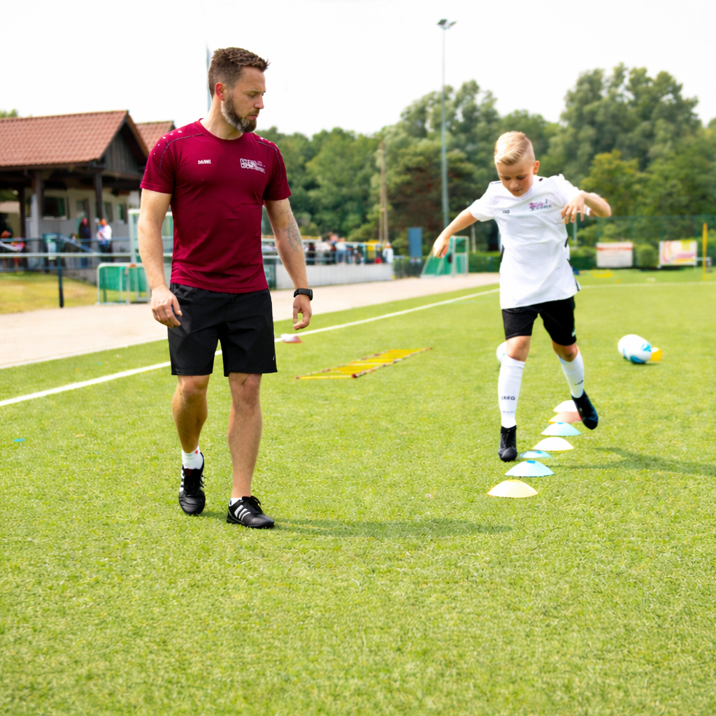Trainer mit Spieler